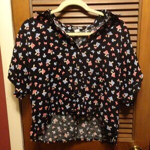 a medium black cropped hot topic button down with red and blue mushrooms on it!
